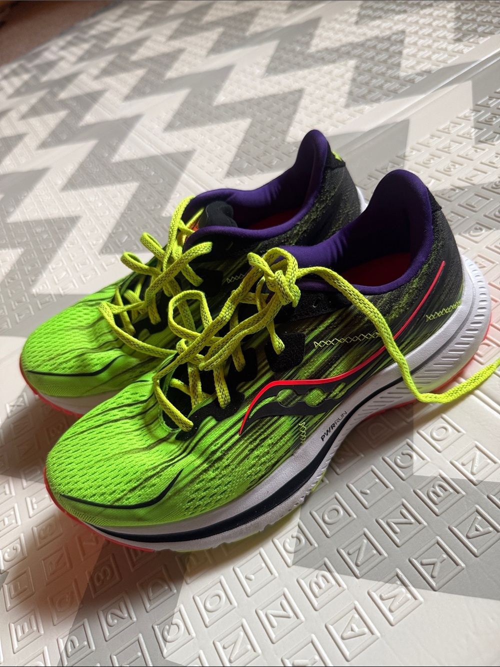 Saucony Neon Green and Black Women's Running Shoes with Purple Lining